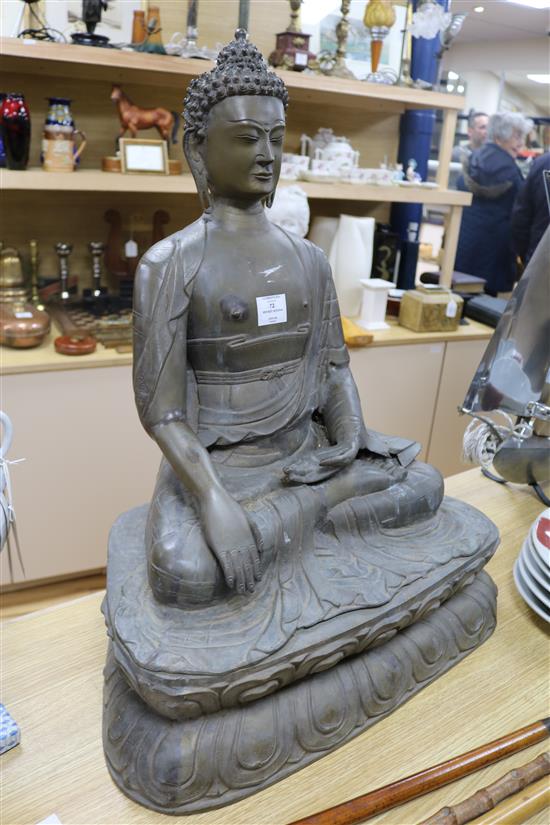 A large bronze seated figure of a Buddha shakyamuni height 69cm